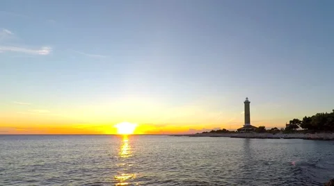 Veli Rat lighthouse at sunset Stock Footage 63227449