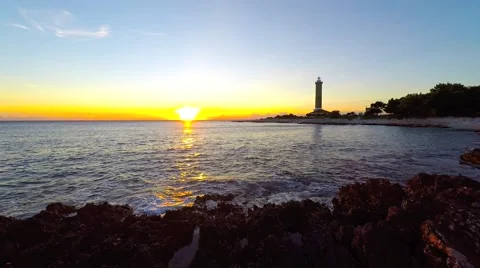 Veli Rat lighthouse at sunset Stock Footage 63227552