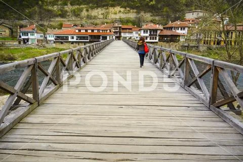 VELIKO TARNOVO, BULGARIA, 05 APRIL, 2015: Young woman cross the Bishop's brid Stock Photos