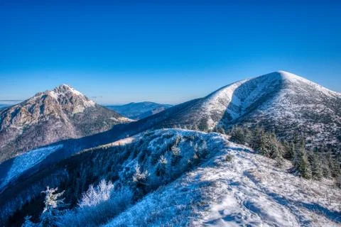 Velky Rozsutec and Stack stacked with snow in winter , slovakia Stock Photos