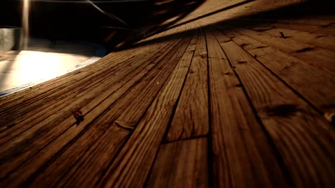 Velodrome cyclist rotates in an empty stadium, light and shadow - Slow Mo Stockbeeldmateriaal 147002997
