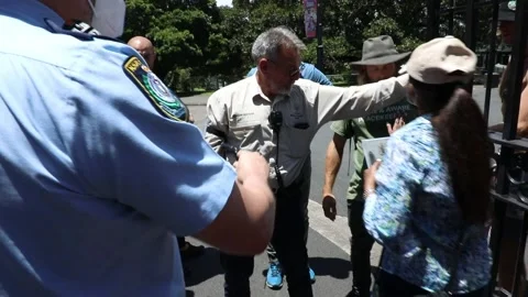 Velvet revolution protest force their way into the Royal Botanic Garden Sydney Stock Footage 167106969
