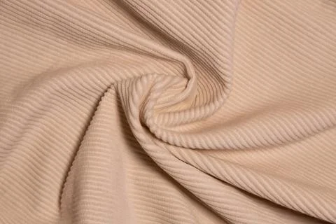 Velvety fabric texture pattern. Texture of velvet textile nude color. Stock Photos