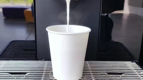 Vending coffee machine prepare latte. Morning drink is poured into a cup. Видео 282049284
