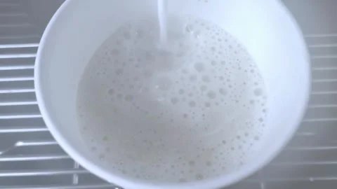 Vending coffee machine prepare latte. Morning drink is poured into a cup. Stock Footage 282049632