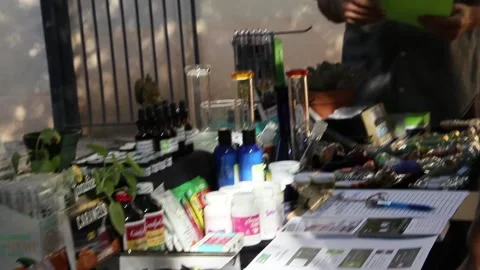 A vendor at a cannabis fair Stock Footage 154561880