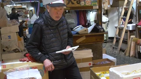 Vendor Doing Paperwork Inside The Biggest Fish Market In Tokyo, Japan Stock Footage 158993827