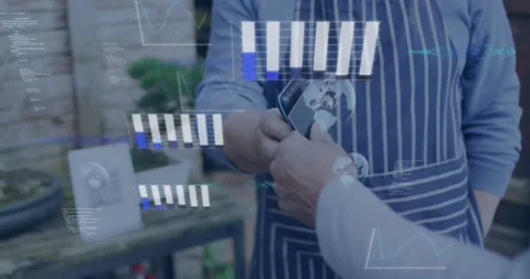 Vendor holding terminal while customer tapping card, starting growing data bars Stock Footage 328485779