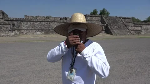 Vendor Makes Jaguar Call With Audio, Teotihuacan, Mexico City Stock Footage 154635925