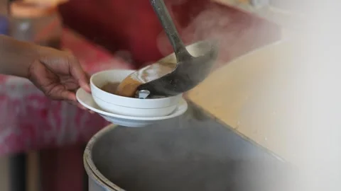 Vendor Preparing Coto Makassar Traditonal Beef Soup. Coto Makassar, traditional  Stock Footage 247167004