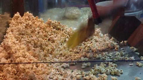 Vendor Scooping Popcorn 스톡 동영상 328512266