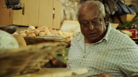 Vendor selling vegetables Stock Footage 32195110