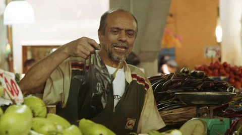Vendor selling vegetables Stock Footage 32207871
