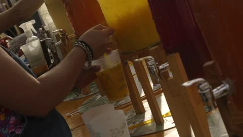 Vendor serving juice Stock Footage 291555994