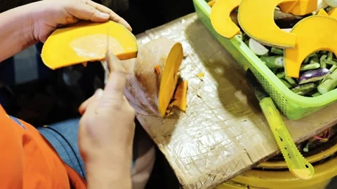 Vendor Slicing Fresh Pumpkin at Old Public Market in Puerto Princesa City Stock Footage 342198858