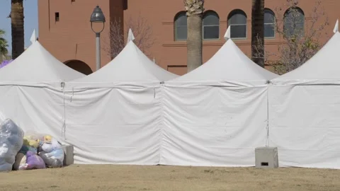 Vendor tents being set up 스톡 동영상 330083047