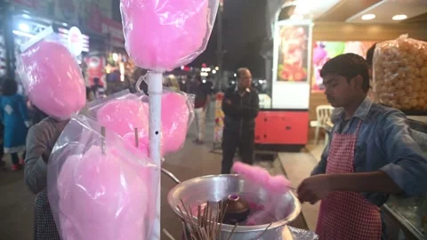 Vendor Twirling Cotton Candy In Machine Stock Footage 233411653