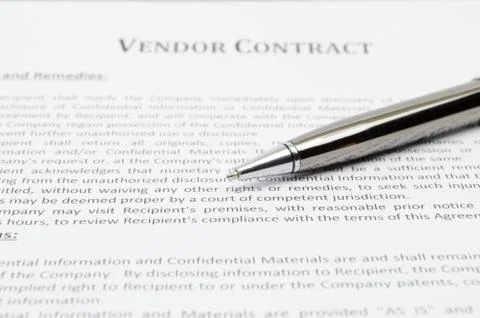 Vendore contract with dark silver pen Stock Photos