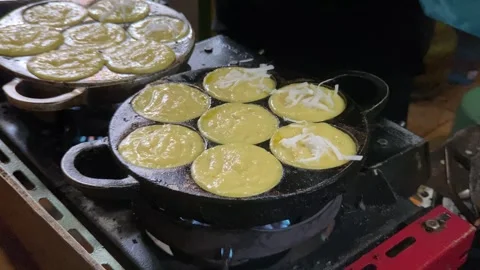 Vendors are making mud cakes at the market. Stock Footage 288263438