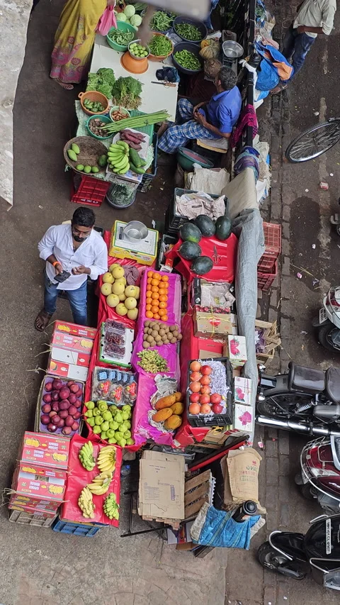 Vendors selling various items using QR codes for digital payments,Mumbai, India. Video stock 239729023