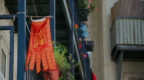 Venetian flag on a balcony Stock Footage 22241846