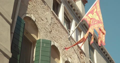 Venetian flag blown bya the wind Stock Footage 141691037