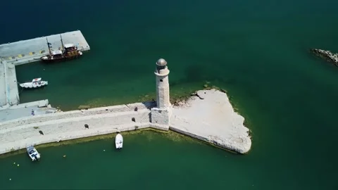 Venetian Harbour Lighthouse in Rethymno Stockbeeldmateriaal 249944449