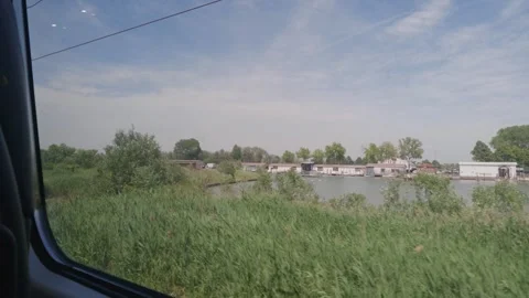 Venetian Lagoon waterfront viewed from train, Italy Stock-Footage 343342995