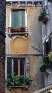 Venetian windows with planter boxes Stock Photos