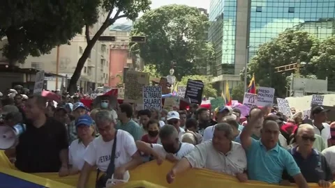 Venezuelan workers protest to demand better working conditions, Caracas, VE - 01 Stock Footage 240031525