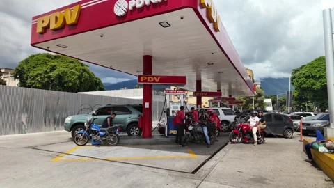 Venezuelans Queue for Gasoline as Nation's Oil Industry Struggles. PDVSA Gas Stock Footage 319650219
