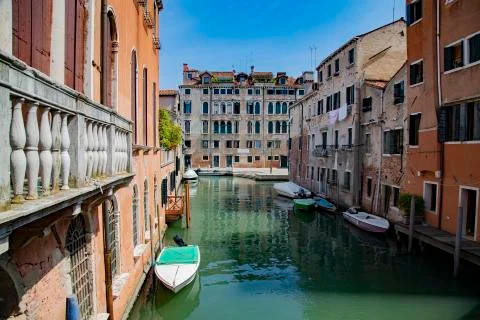 Venice architecture narrow water canal and historic buildings. Stock Photos