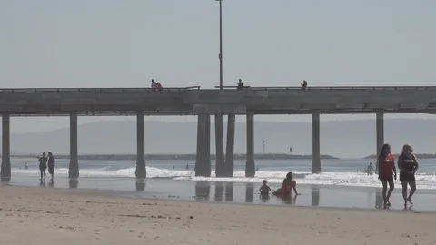 Venice Beach small waves break. The pier in background. Stock Footage 121243157