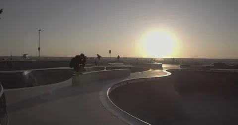 Venice Beach - Tracking Along The Venice Skatepark Revealing A Photographer Stock Footage 86243781