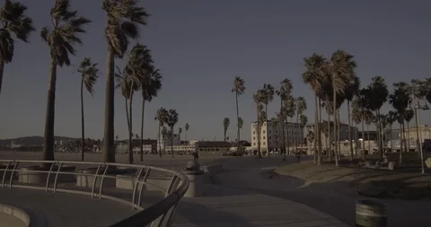 Venice Beach - Tracking The Boardwalk From The Venice Skatepark Stock Footage 86244087