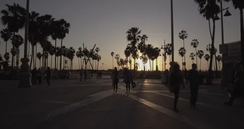 Venice Beach - Tracking The Main Courtyard With Shadow People In Foreground Stock Footage 86244925