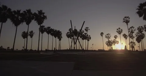 Venice Beach - Tracking Towards The Main Courtyard With People In Foreground Stock Footage 86245024