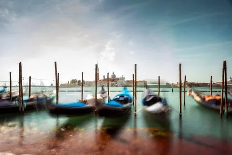 Venice cityscape view on Santa Maria della Salute basilica with gondolas on t Stock Photos