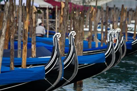 Venice gondolas at the pier Stock Photos