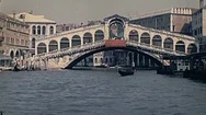 Venice, Italy - 1970: Gondola Under The Rialto Bridge Stock Footage