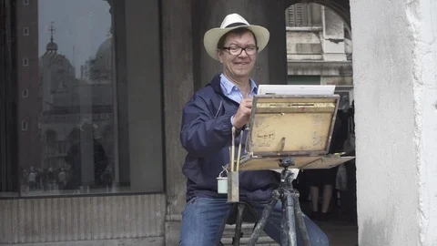 Venice Italy St. Marks Square artist painting watercolor portrait of Basilica Vidéo 99282473