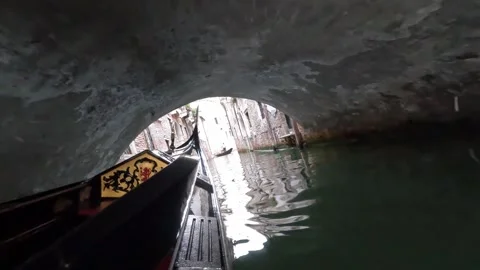 Venice - Passing Under Canal Bridge in Traditional Gondola Stock Footage 341388339