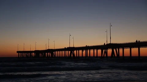 Venice pier and beach on pacific ocean at sunset los angeles california Stock Footage 108981843
