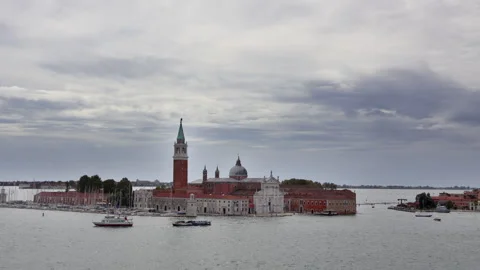 Venice San Giorgio Maggiore cloud skyline with boats on lagoon Stock Footage 291450875