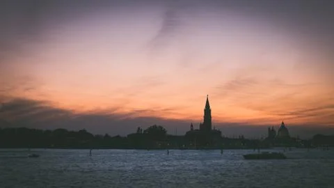 Venice at sunset with boats Stock Photos