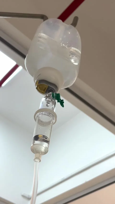 Venoclysis system and saline solution bag. Health concept Stock Footage 297419006