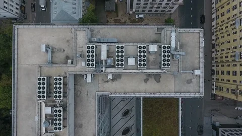 Ventilation and air conditioning devices on the roof of a modern building. Video stock 129552602