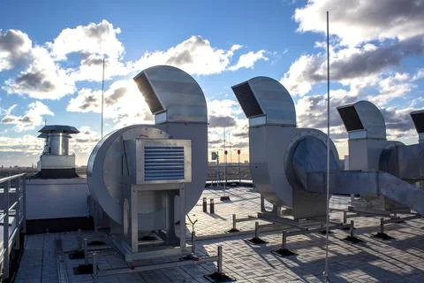 Ventilation and air conditioning system installed on the roof of an office bu Stock Photos