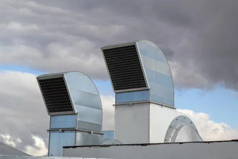 Ventilation and air conditioning system installed on the roof of an office bu Stock Photos