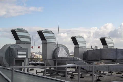 Ventilation and air conditioning system installed on the roof of an office bu Stock Photos
